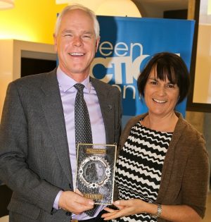 Cathy Steven (Health in Common) presents Eric Wiens (Stantec) with this year's Commuter Friendly Workplace Award