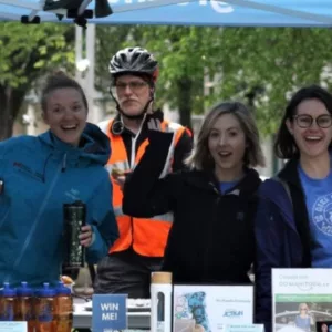 group of Green Action Centre staff posing close together and smiling for the camera