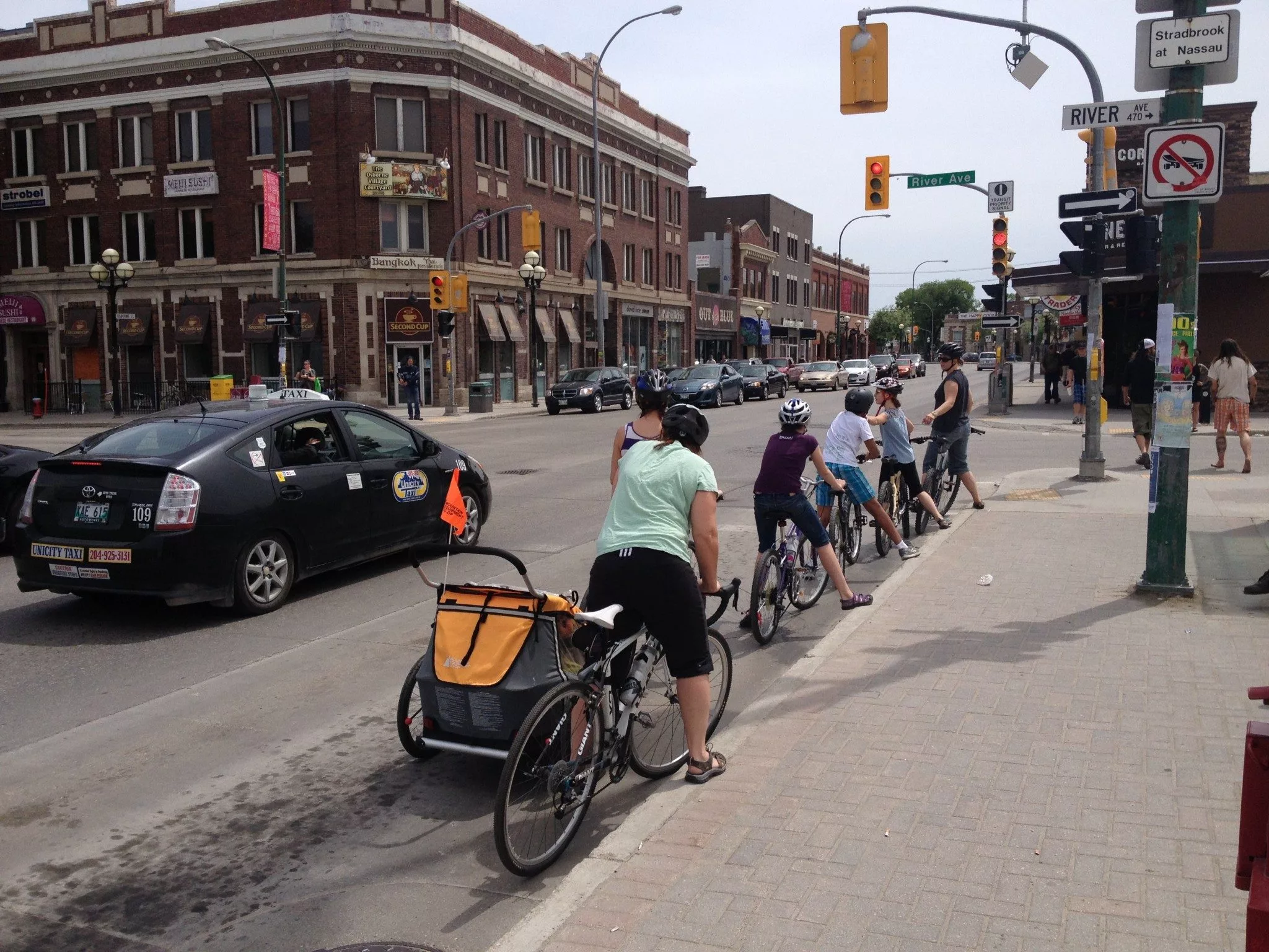 Adolescents learning to cycle on road - Chris Baker - with permission