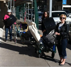 Ciclovia - hauling the display - Photo by Green Action Centre