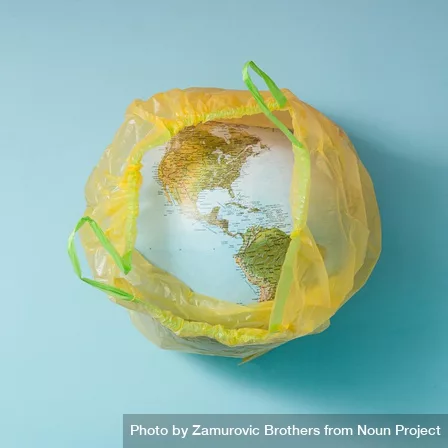 planet earth in a yellow plastic trash bag, photo by Zamurovic Brothers from Noun Project